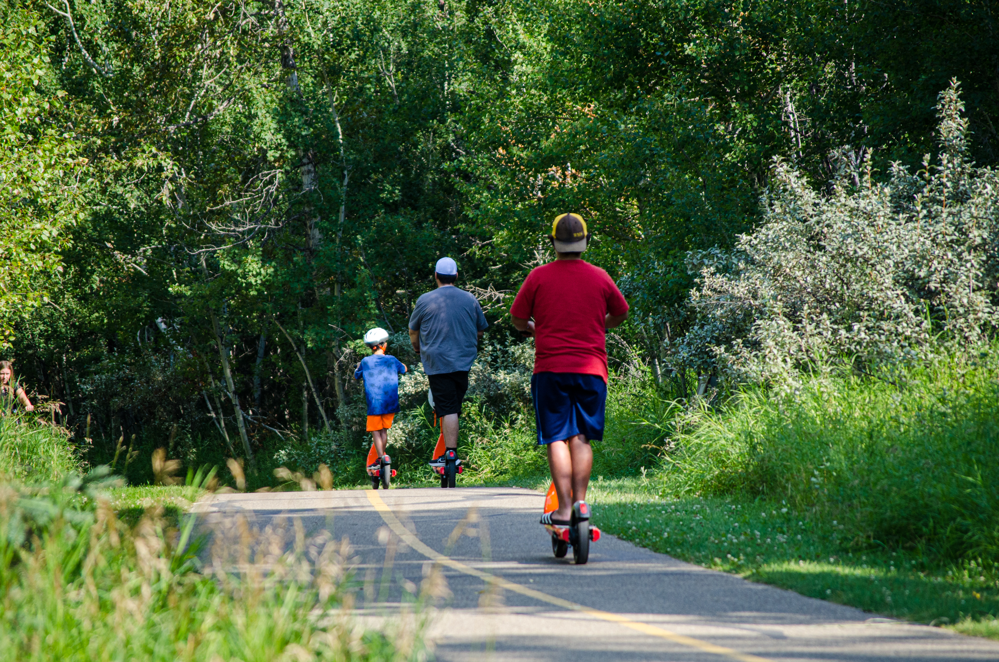 IMAGE OF people riding scooters in Red Deer 