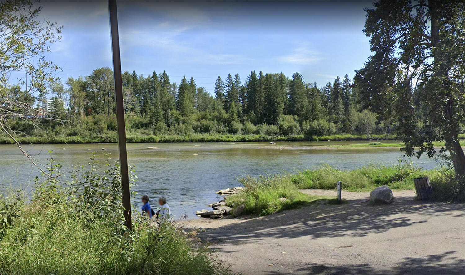 Boat launch on the Red Deer River on a beautiful warm day. 